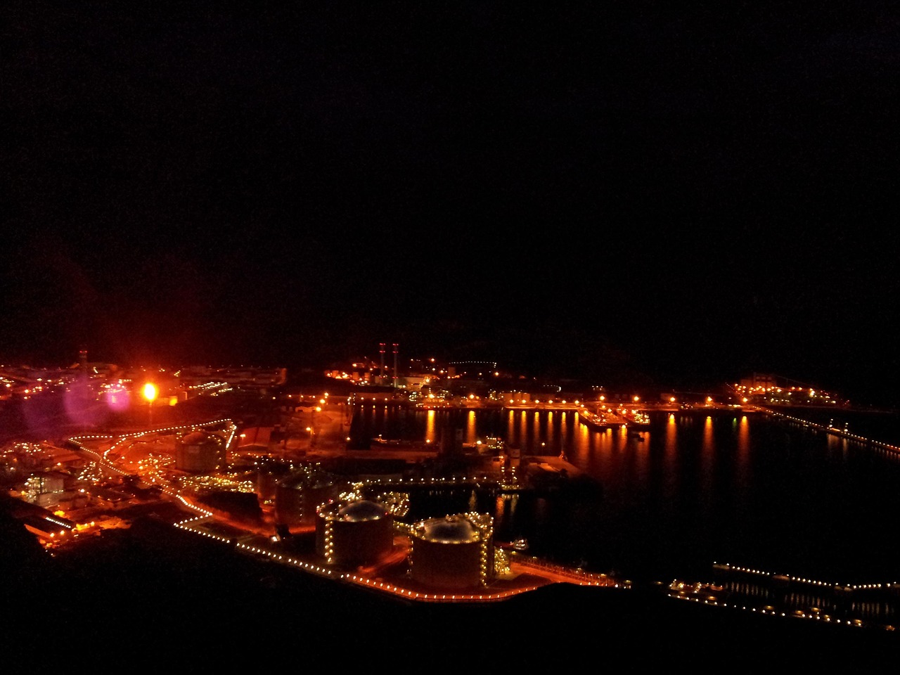 Industrial facility illuminated at night